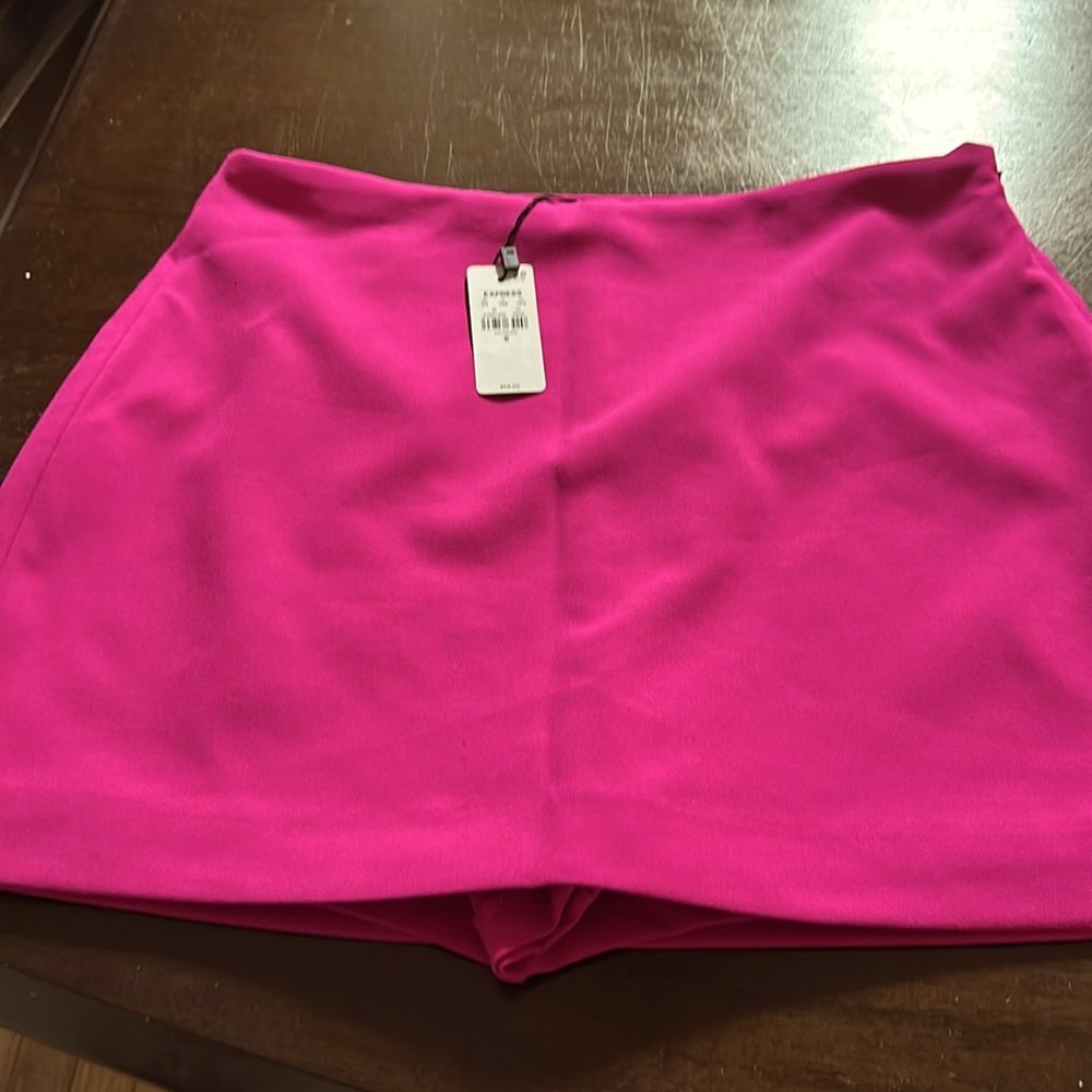 Pink express skort. Will be posting matching blazer with it also brand new